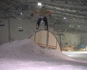 Bs Boardslide over the Rainsbow Rail